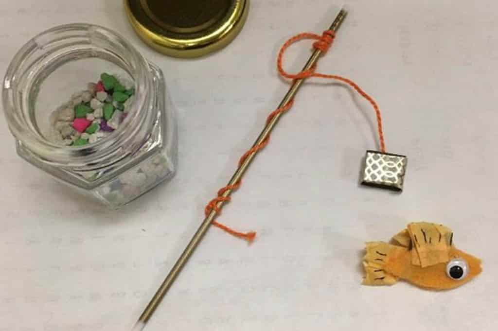 Mini goldfish with fishing pole and jar