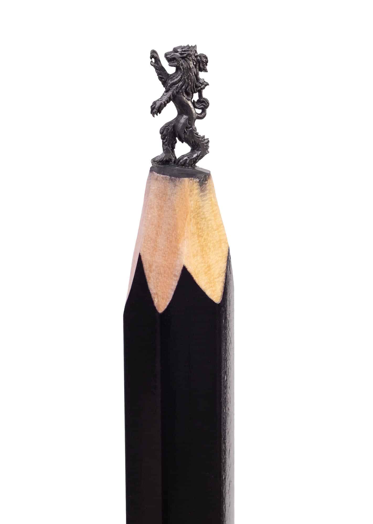 Game of Thrones House of Lannister Lion carved on the tip of a black pencil.